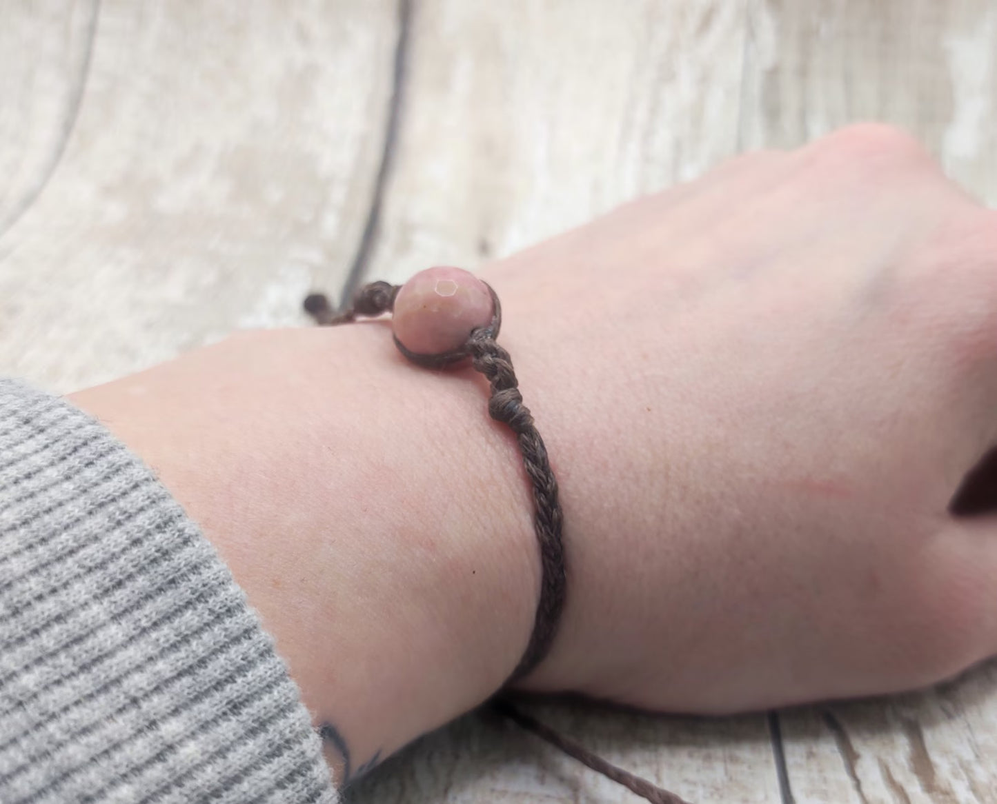 Rhodochrosite macrame woven adjustable bracelet.