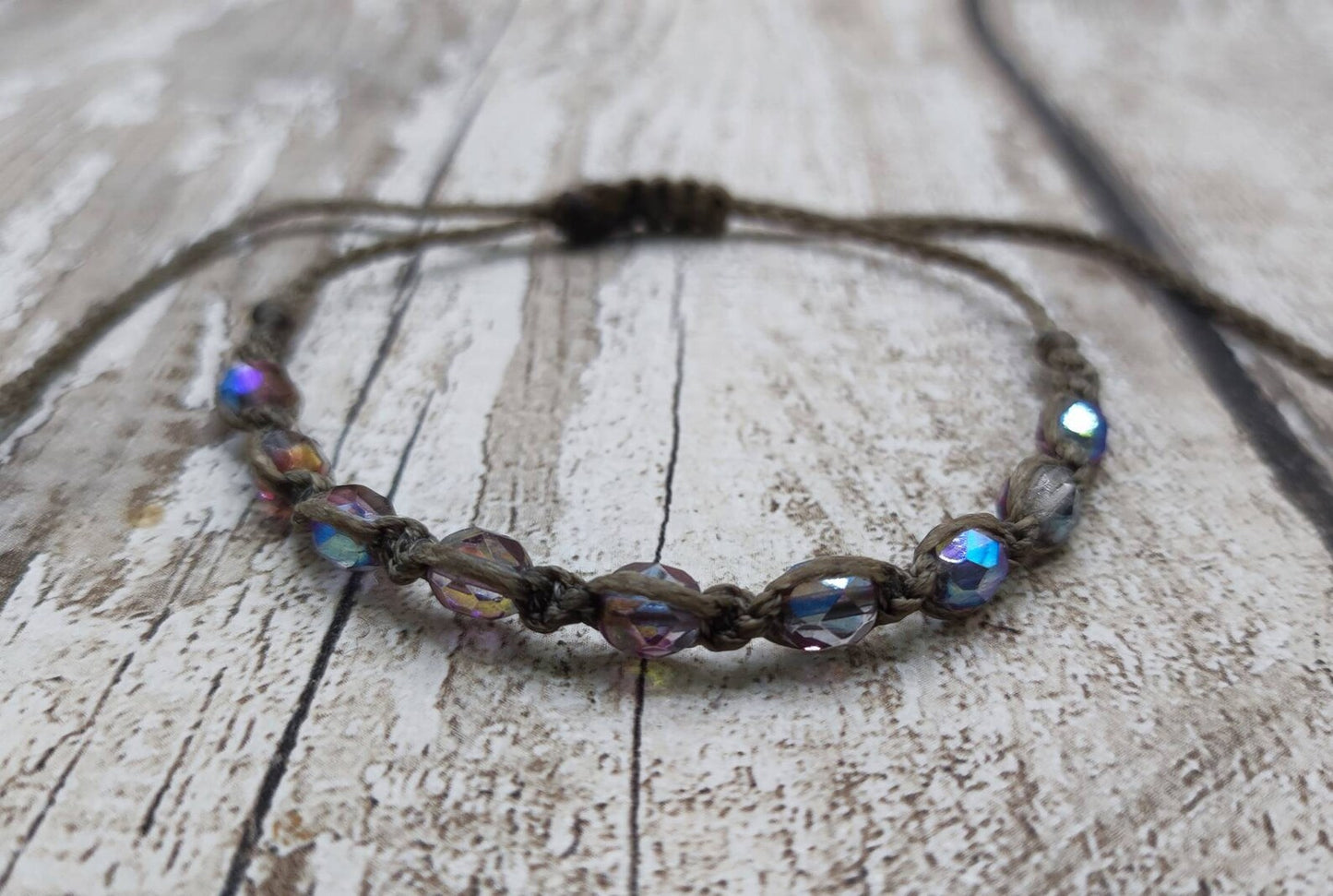 Glass bead macrame woven adjustable bracelet.
