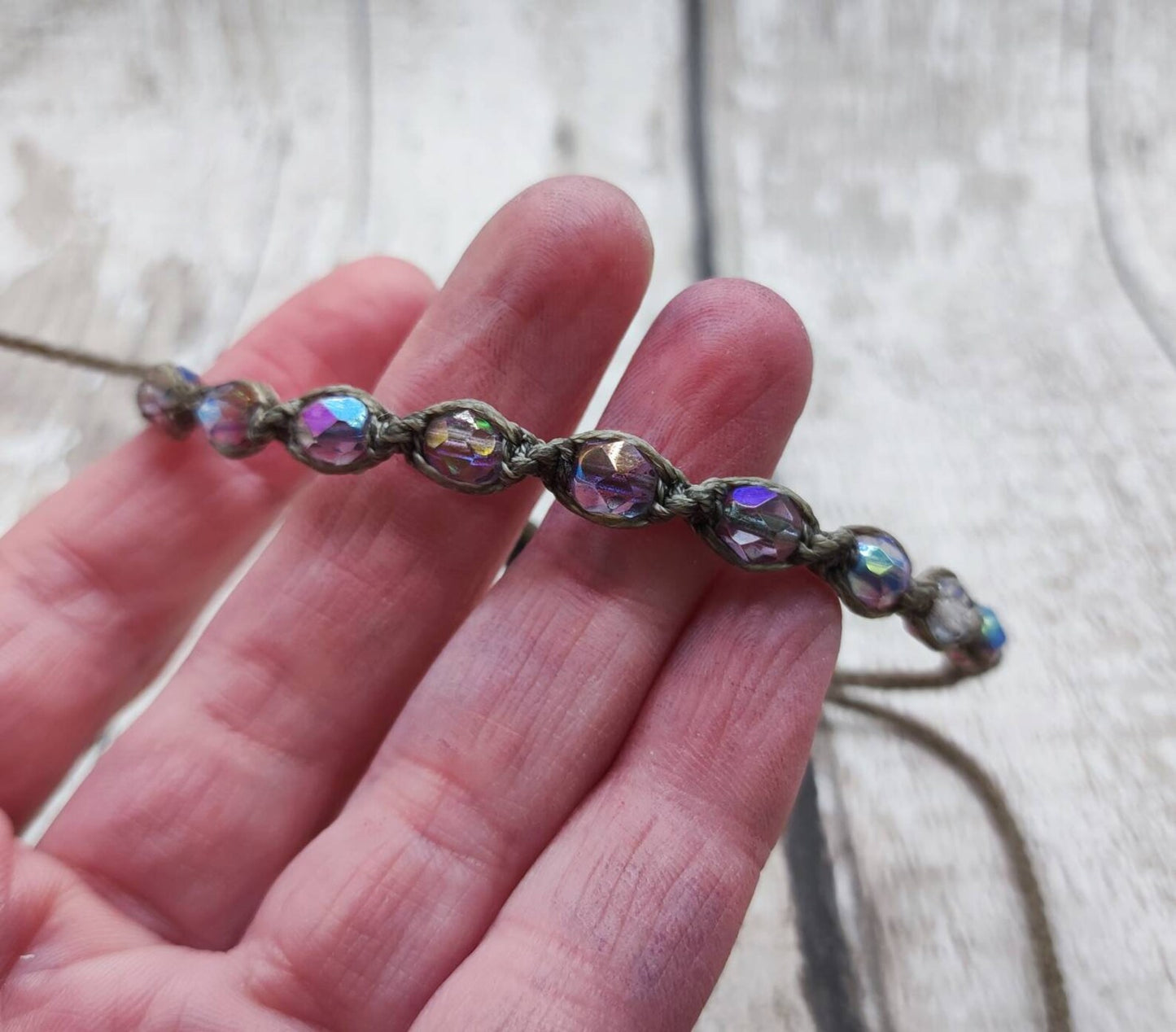 Glass bead macrame woven adjustable bracelet.
