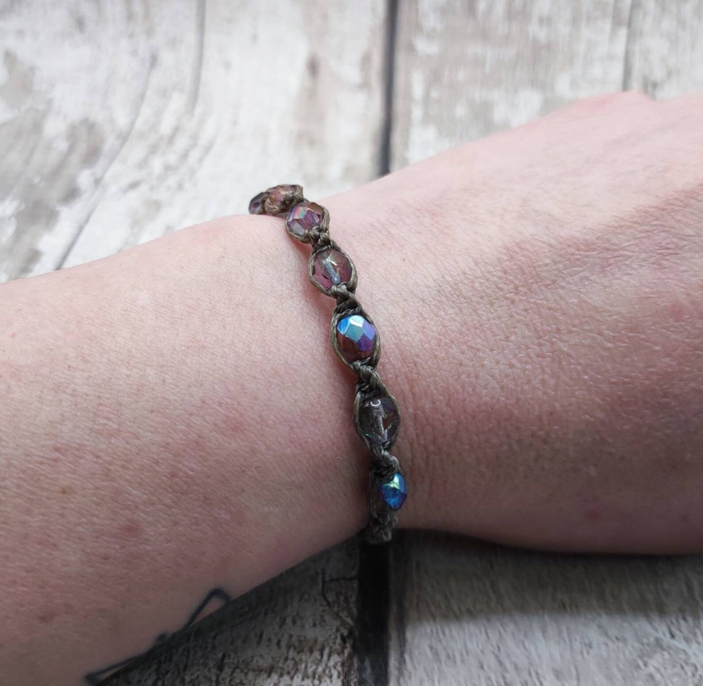 Glass bead macrame woven adjustable bracelet.