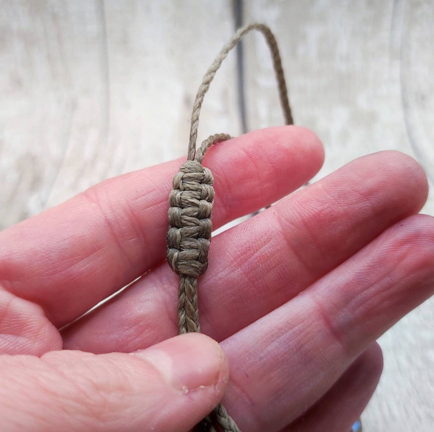Glass bead macrame woven adjustable bracelet.