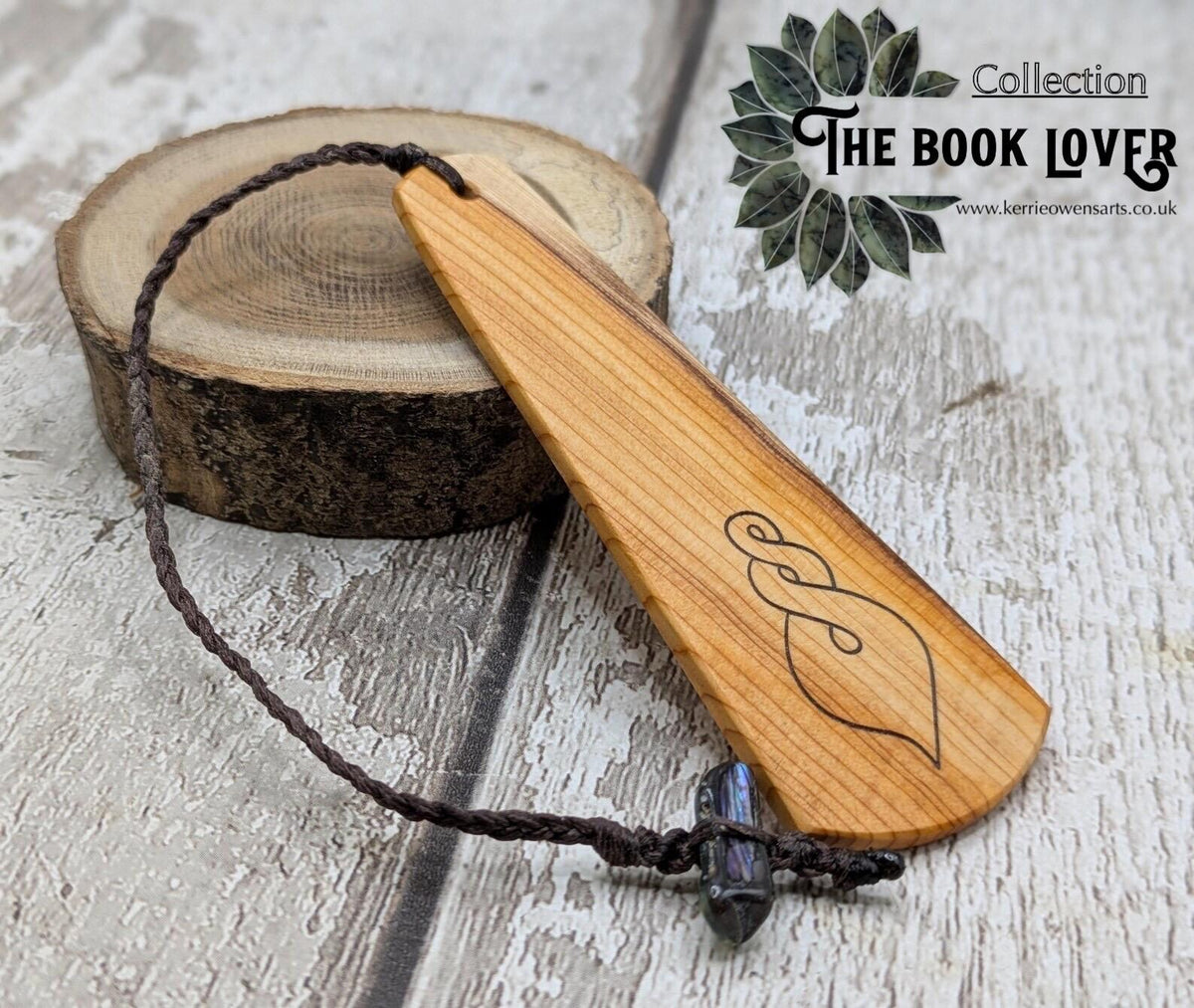 Yew wood pikorua laser printed bookmark with pāua abalone shell bead .