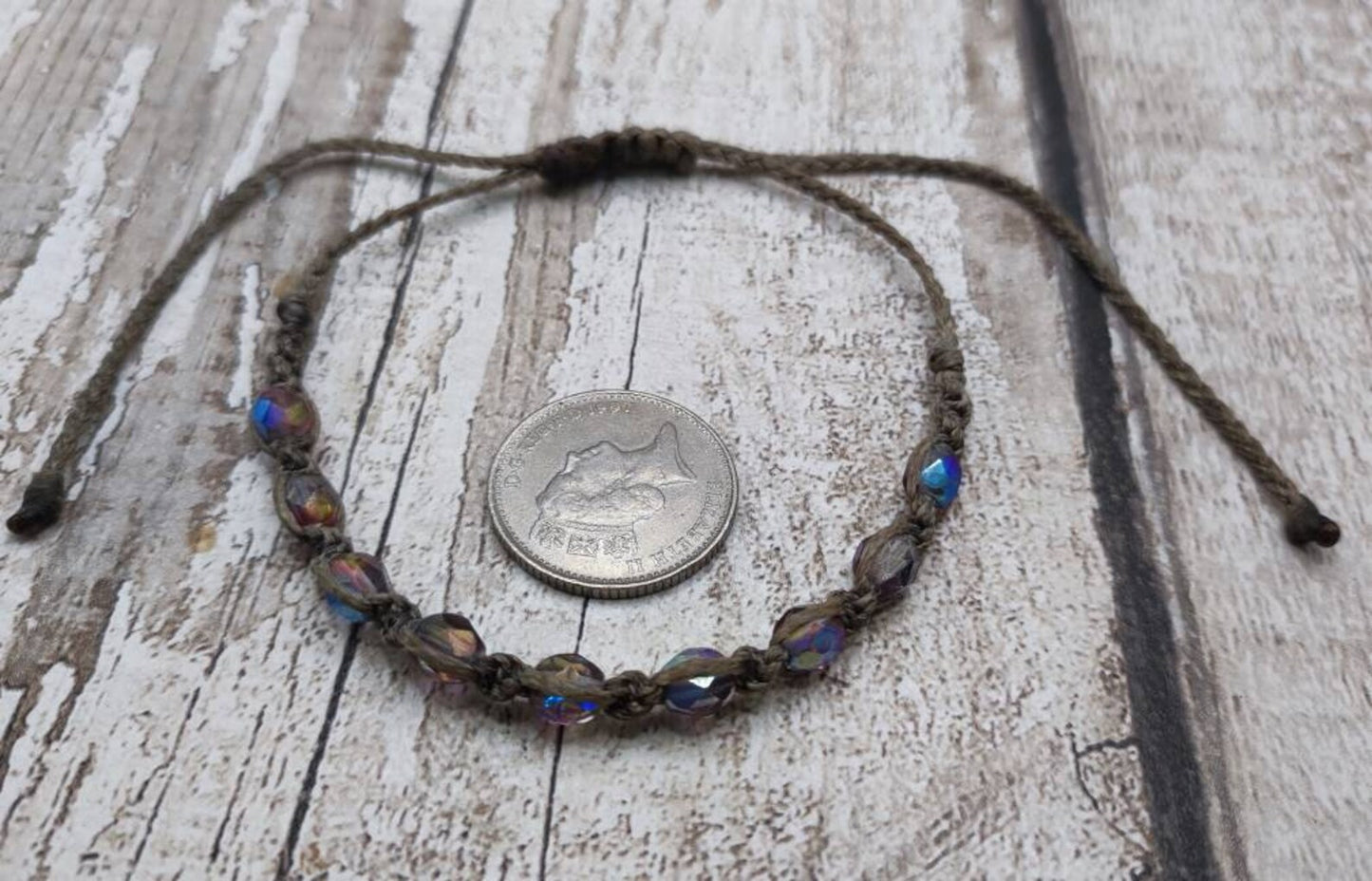 Glass bead macrame woven adjustable bracelet.