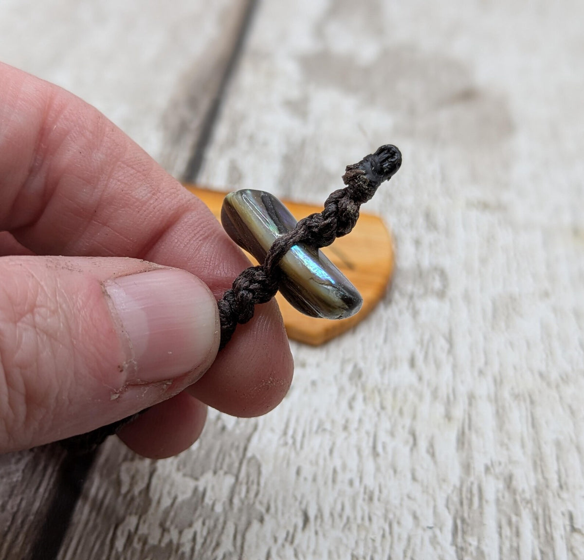 Yew wood pikorua laser printed bookmark with pāua abalone shell bead .