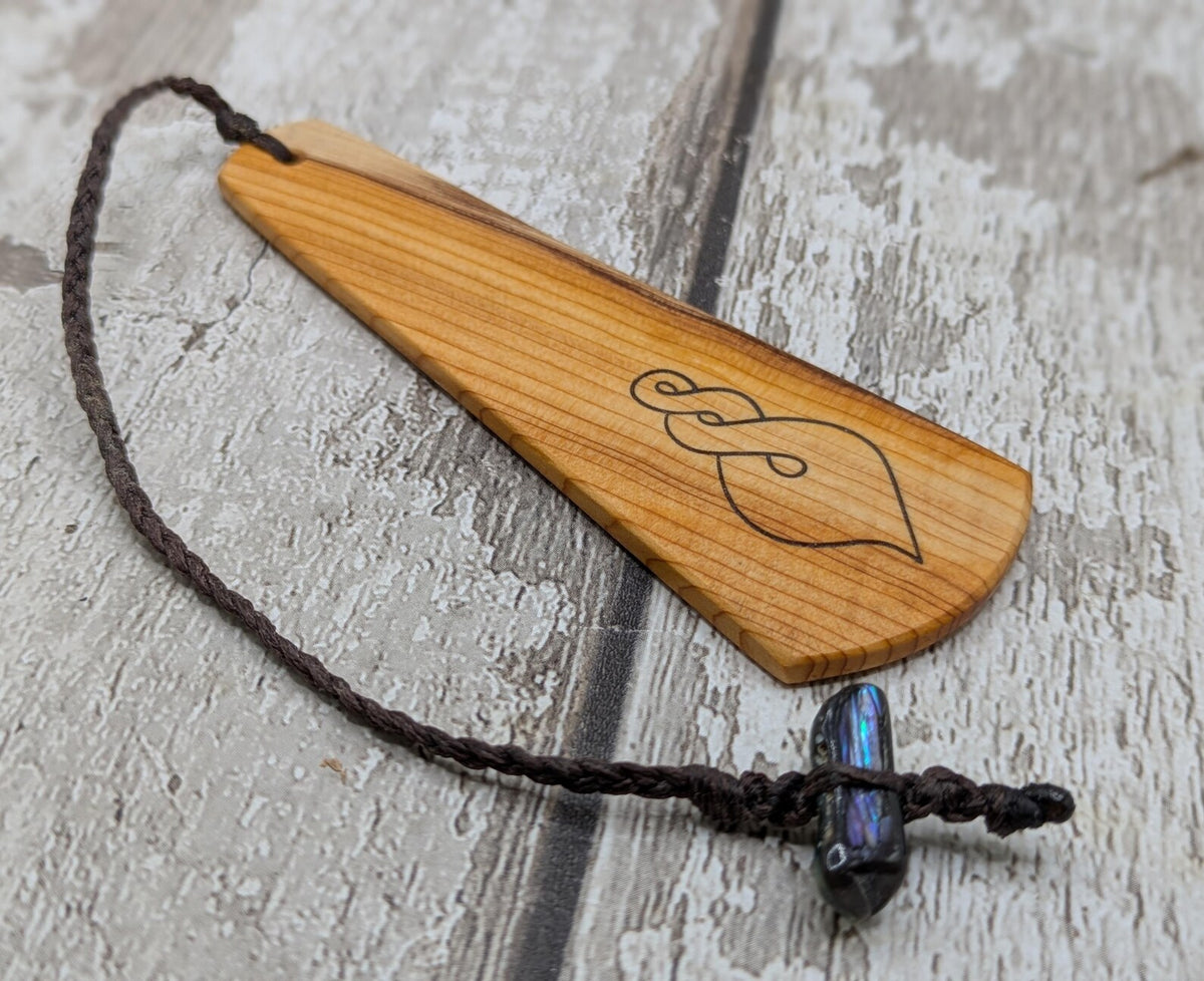 Yew wood pikorua laser printed bookmark with pāua abalone shell bead .