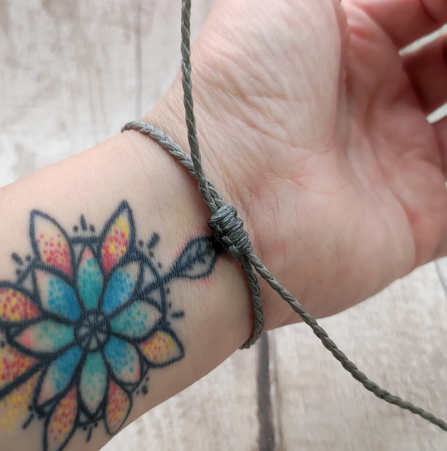 Shungite Hei Toki adze style braided adjustable bracelet.