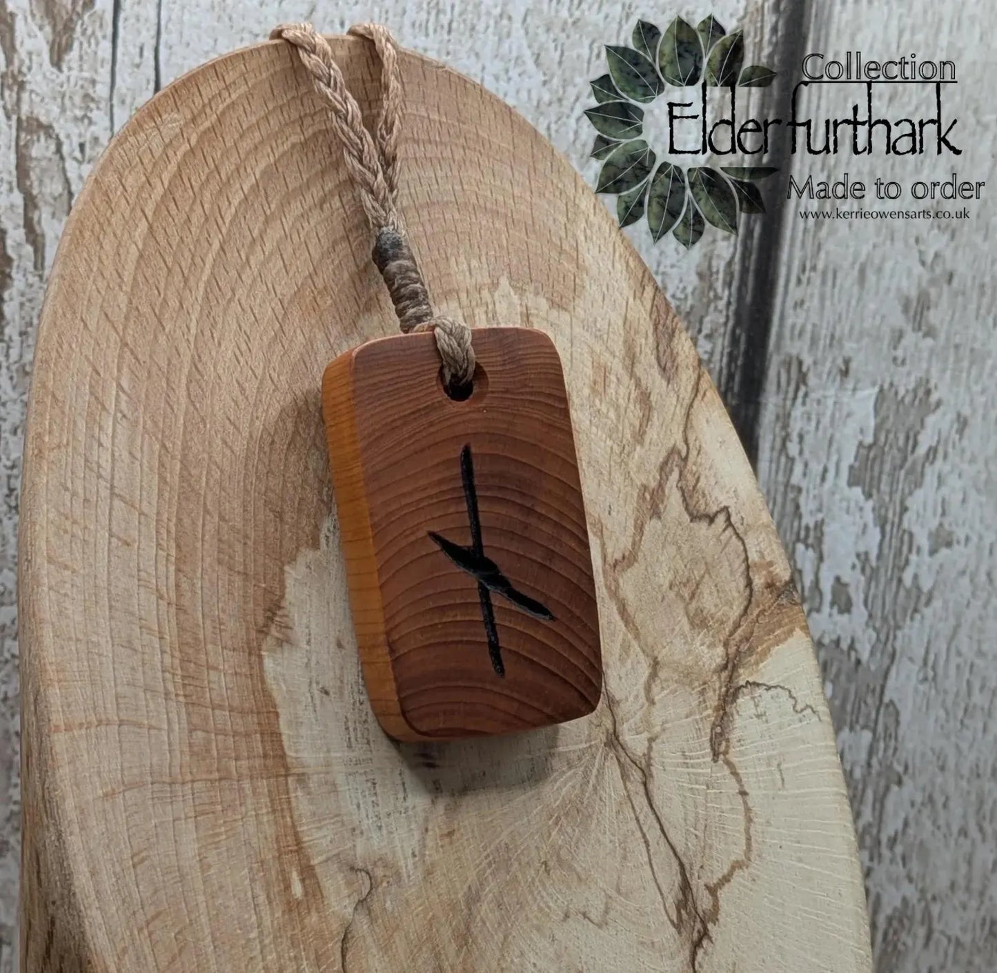 Yew wood Nauthiz rune pendant.