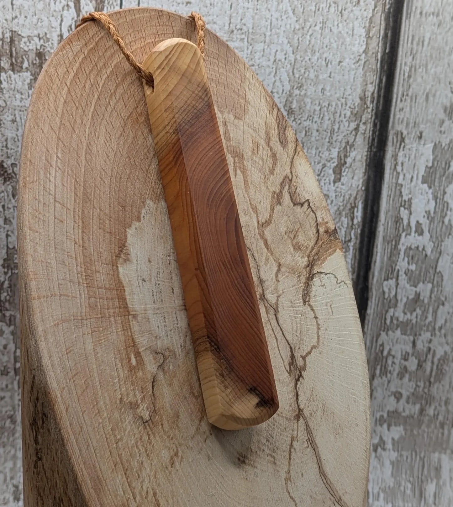 Yew wood roimata pendant.