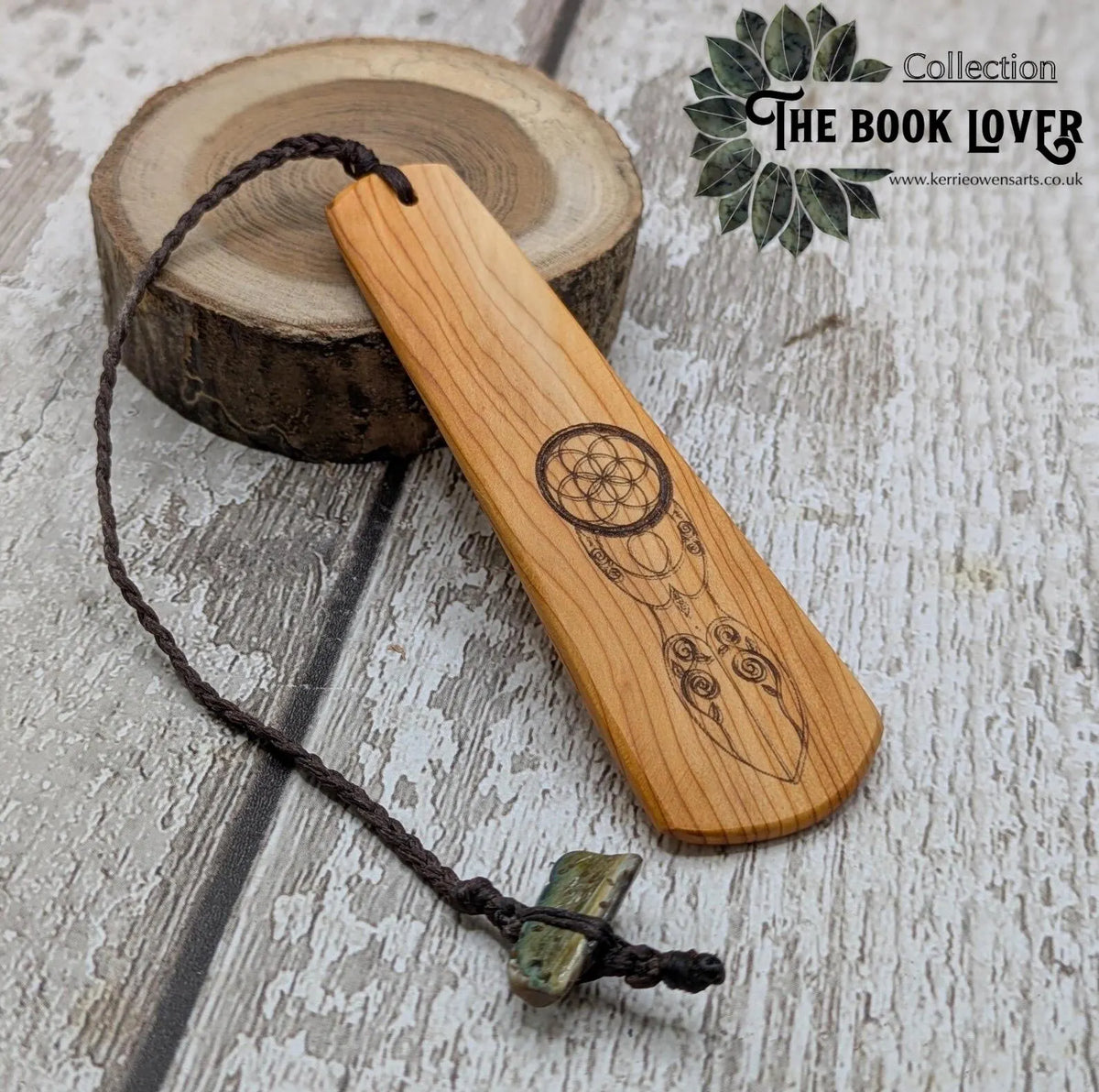 Yew wood, goddess deity laser printed bookmark with pāua shell beaded tassel.