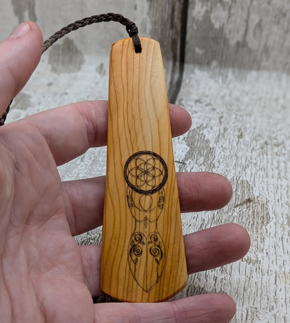 Yew wood, goddess deity laser printed bookmark with pāua shell beaded tassel.