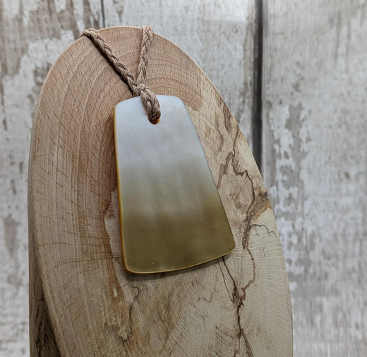 Mother of park Toki inspired shell pendant.