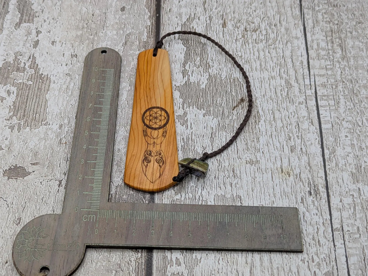 Yew wood, goddess deity laser printed bookmark with pāua shell beaded tassel.