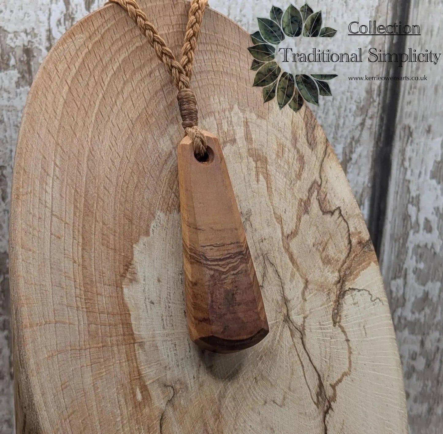 NZ Rimu wood roimata teardrop pendant.