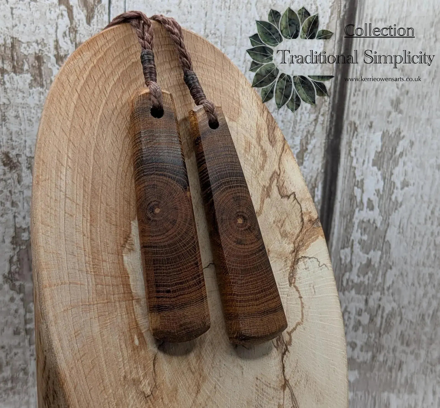 Laburnum wood roimata teardrop carved pendant.