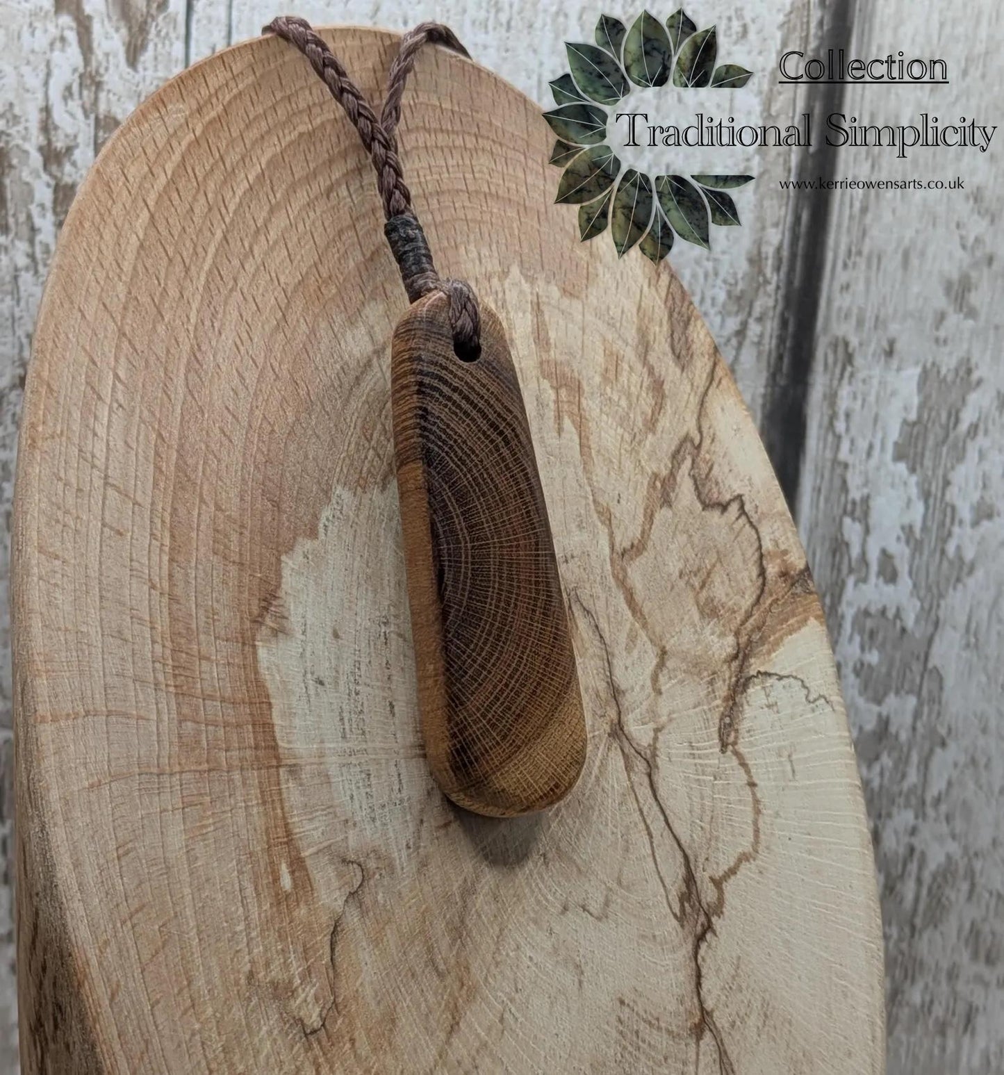 Laburnum wood roimata tear drop pendant.
