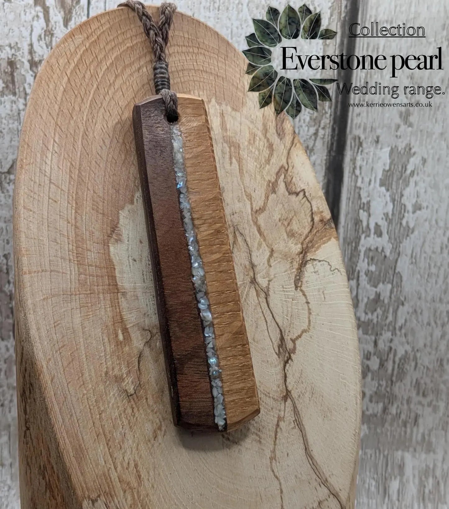 Walnut wood and whiskey barrel oak roimata pendant with freshwater Pearl.