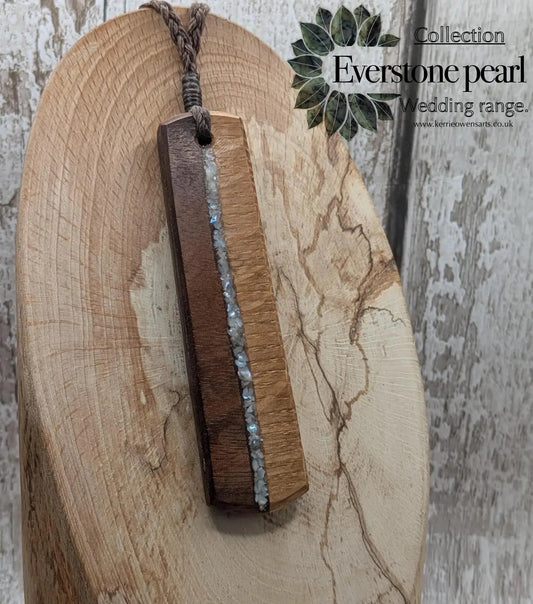 Walnut wood and whiskey barrel oak roimata pendant with freshwater Pearl.