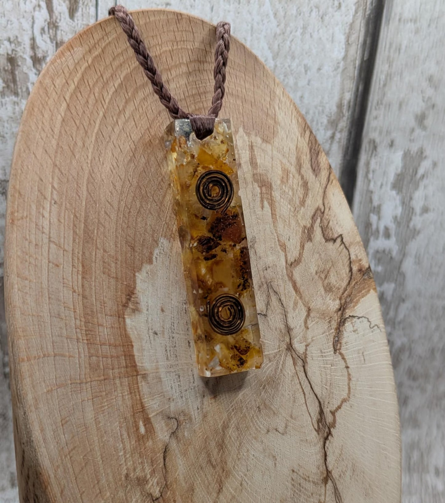 Baltic Amber and copper in resin pendant.