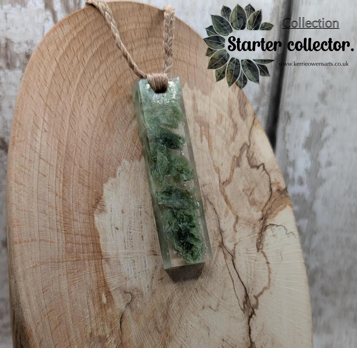 Alaskan jade in resin pendant.