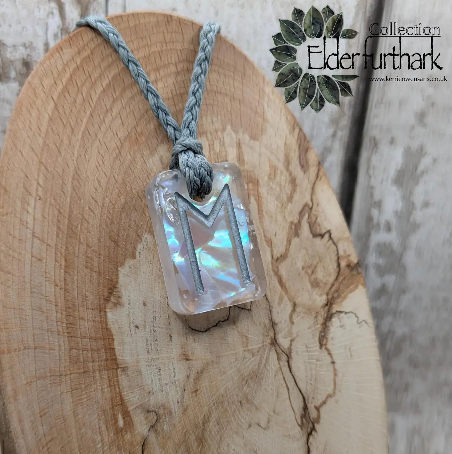 Ehwaz rune pendant in UV resin and mussel shell.