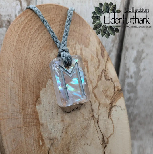 Ehwaz rune pendant in UV resin and mussel shell.