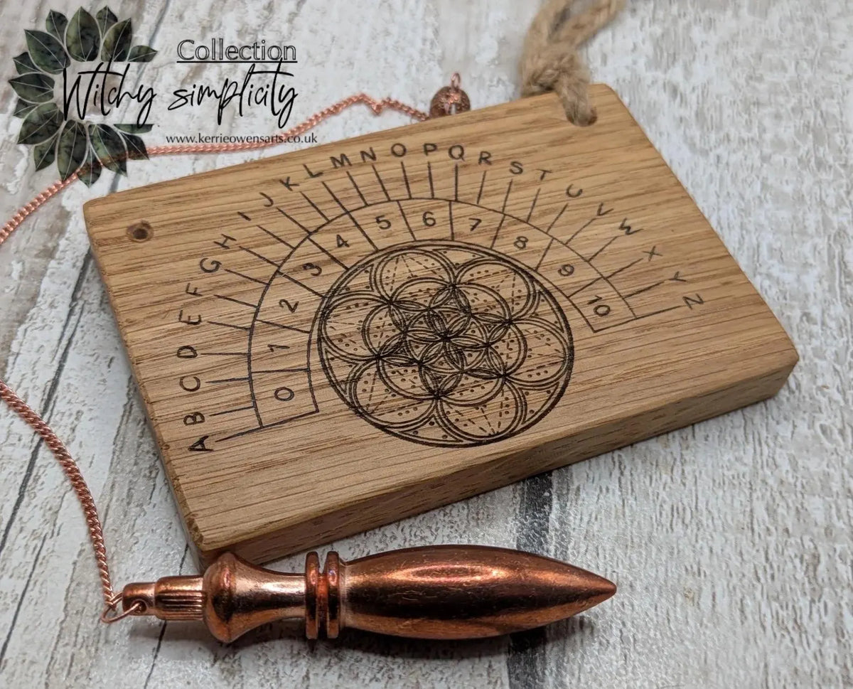 Oak wood pocket pendulum with geometric laser print. Travel sized.