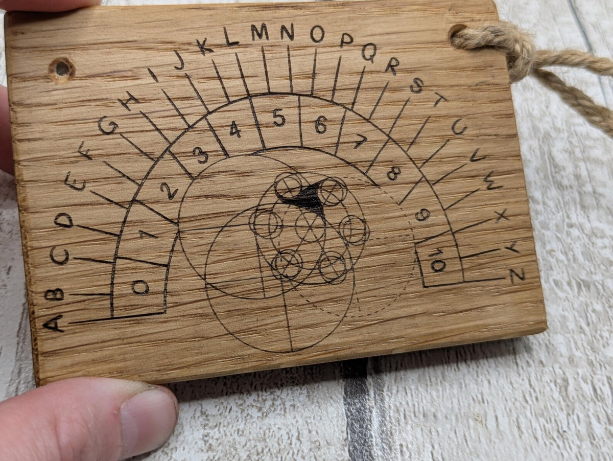 Oak wood pendulum board with Celtic geometric laser print design.