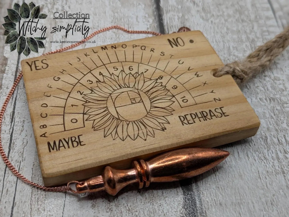 Tulip wood pendulum dowsing board with sunflower laser design.