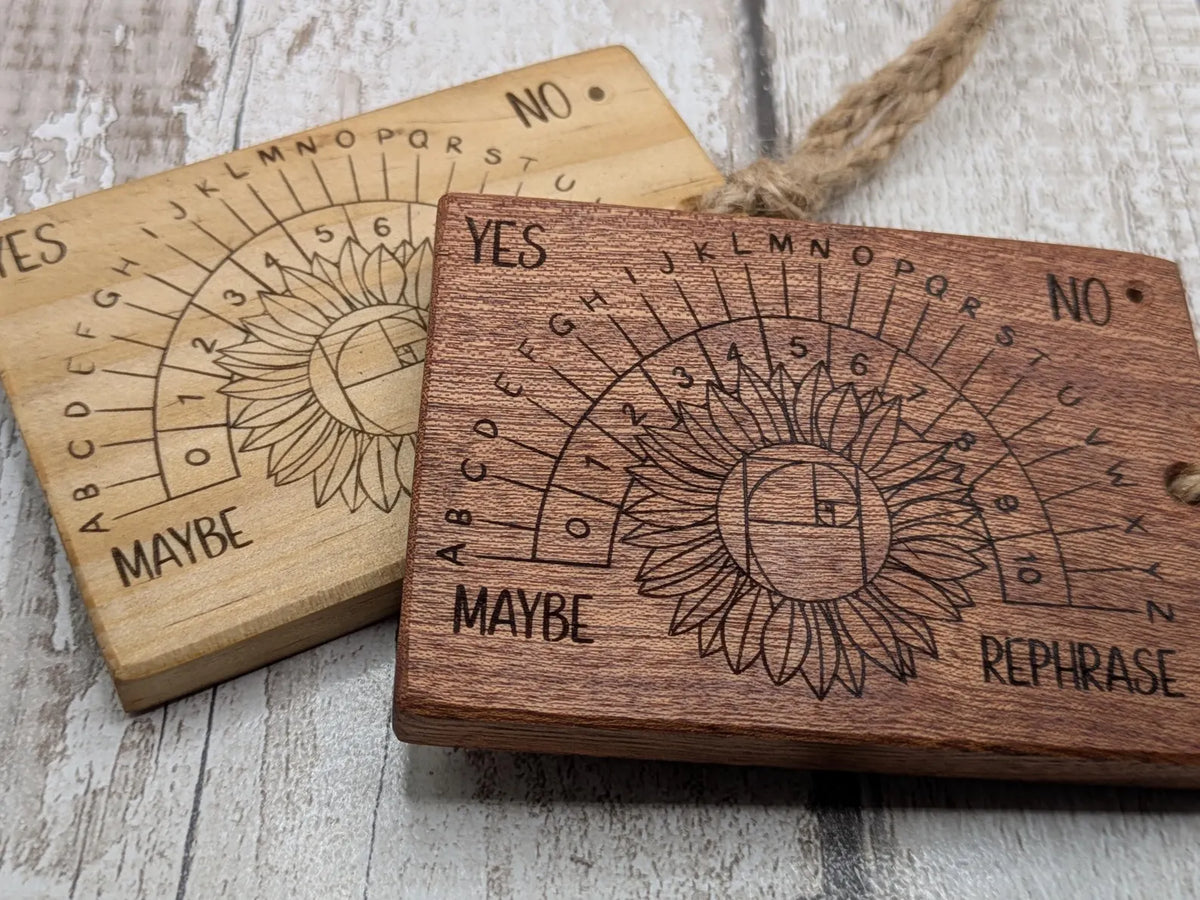 Tulip wood pendulum dowsing board with sunflower laser design.