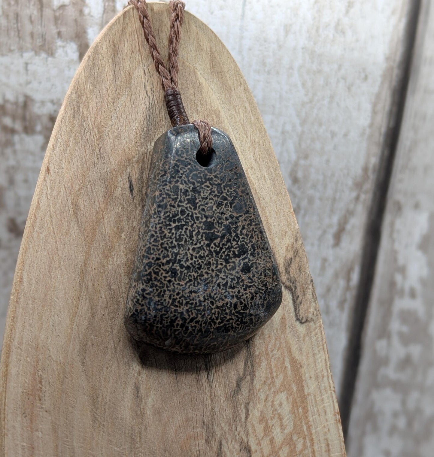 Oxfordshire dinosaur bone toki style pendant.