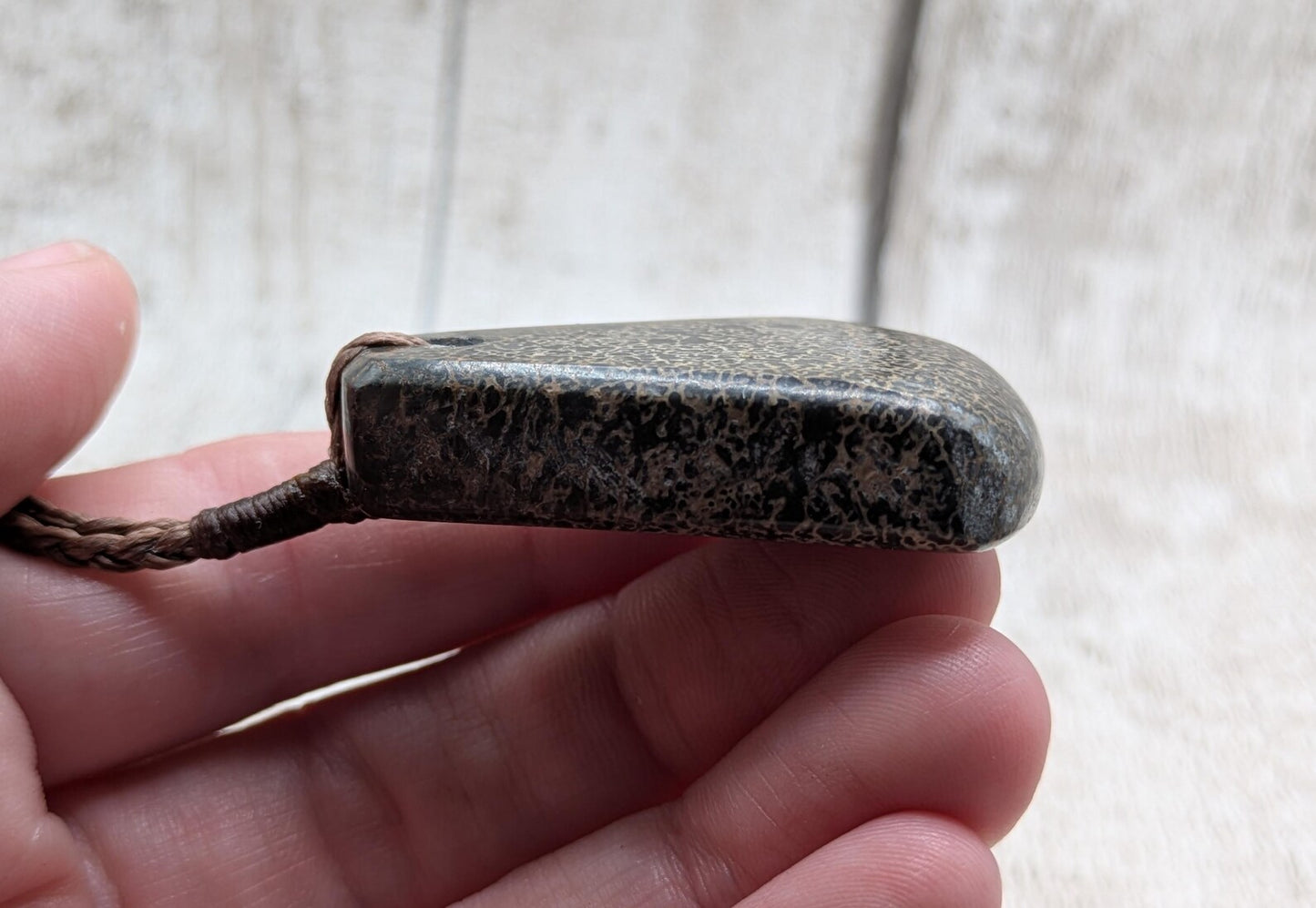 Oxfordshire dinosaur bone toki style pendant.