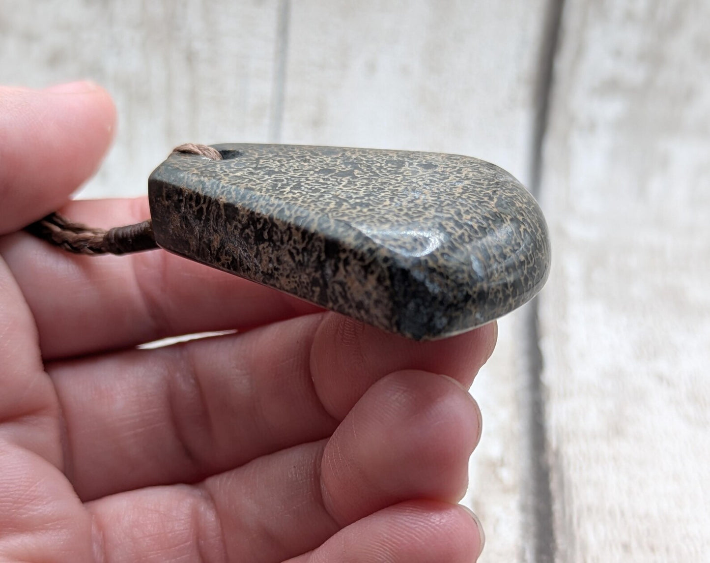 Oxfordshire dinosaur bone toki style pendant.