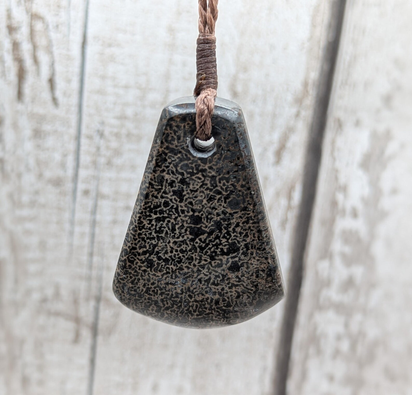 Oxfordshire dinosaur bone toki style pendant.
