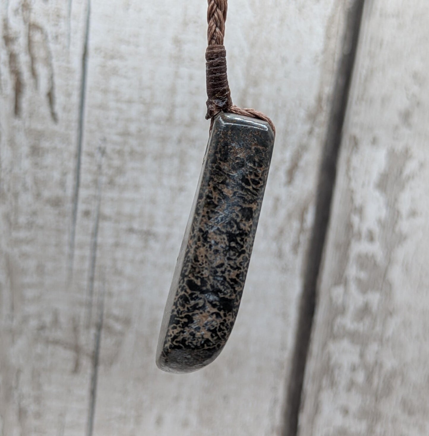 Oxfordshire dinosaur bone toki style pendant.