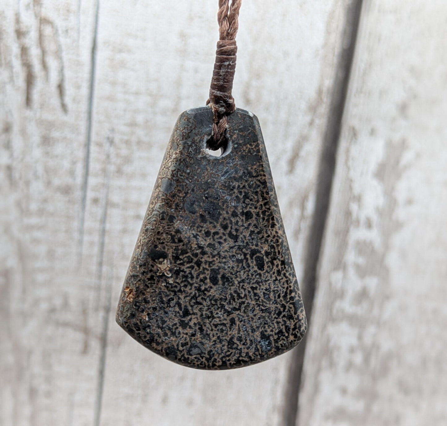 Oxfordshire dinosaur bone toki style pendant.