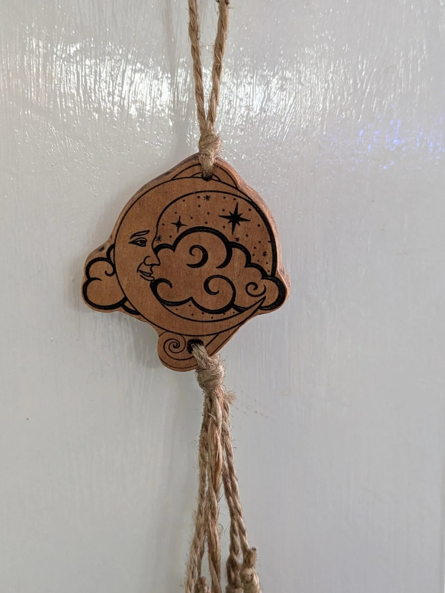 Lime wood , 1920's moon themed witches bells. Laser printed.