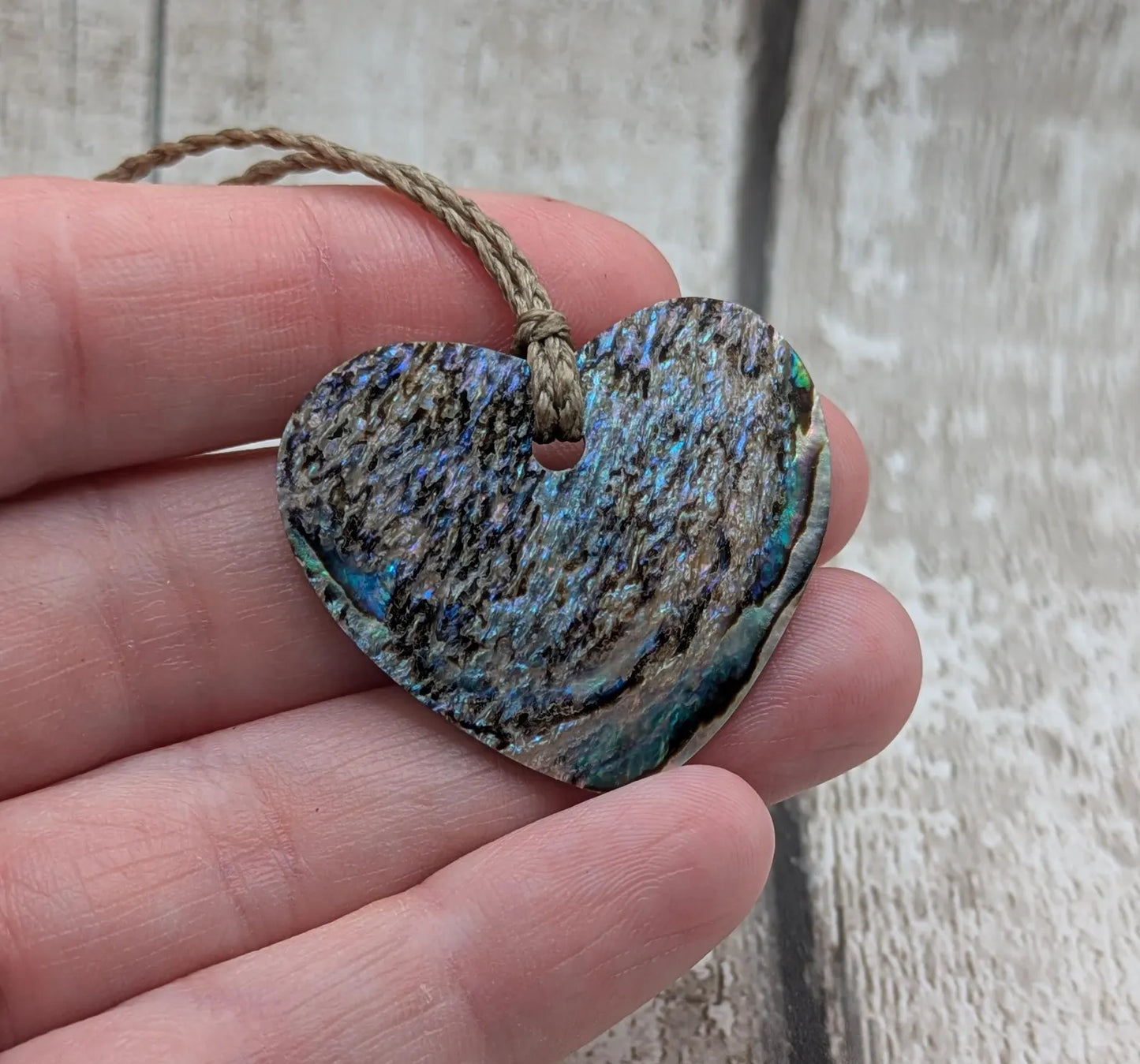 New Zealand Rainbow Pāua Heart Pendant – sea ocean themed love Tonga, Iridescent Abalone Necklace on Adjustable Waxed Cord.
