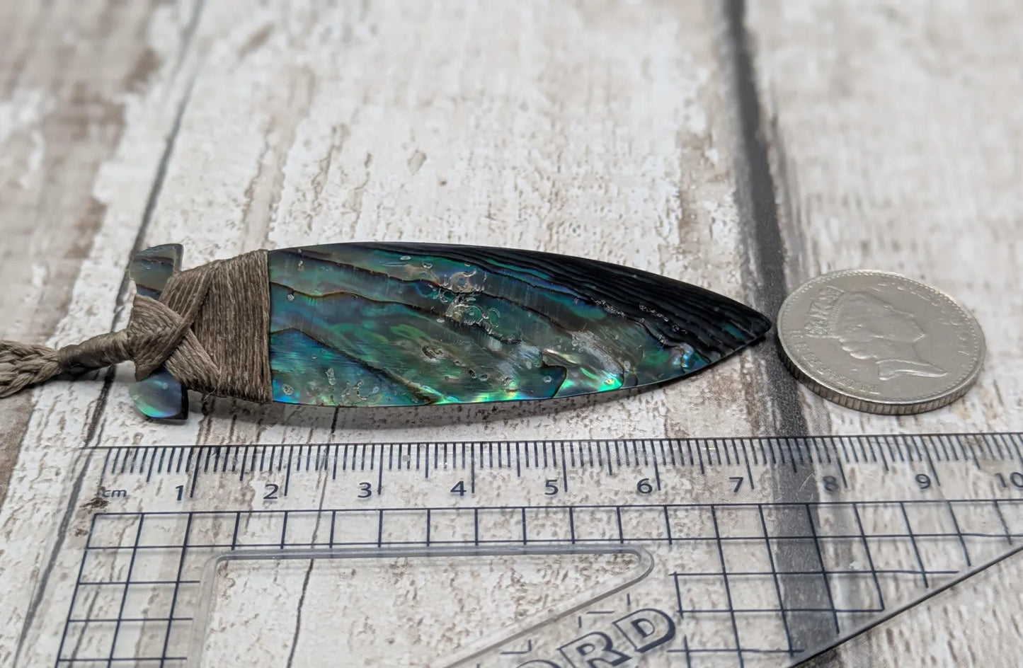 New Zealand Rainbow Pāua Hei Toki Pendant – Iridescent Abalone Adze Necklace sea and ocean themed tonga on Adjustable Cord.
