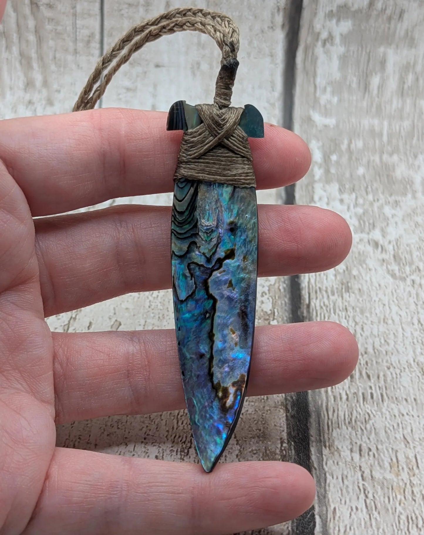 New Zealand Rainbow Pāua Hei Toki Pendant – Iridescent Abalone Adze Necklace sea and ocean themed tonga on Adjustable Cord.