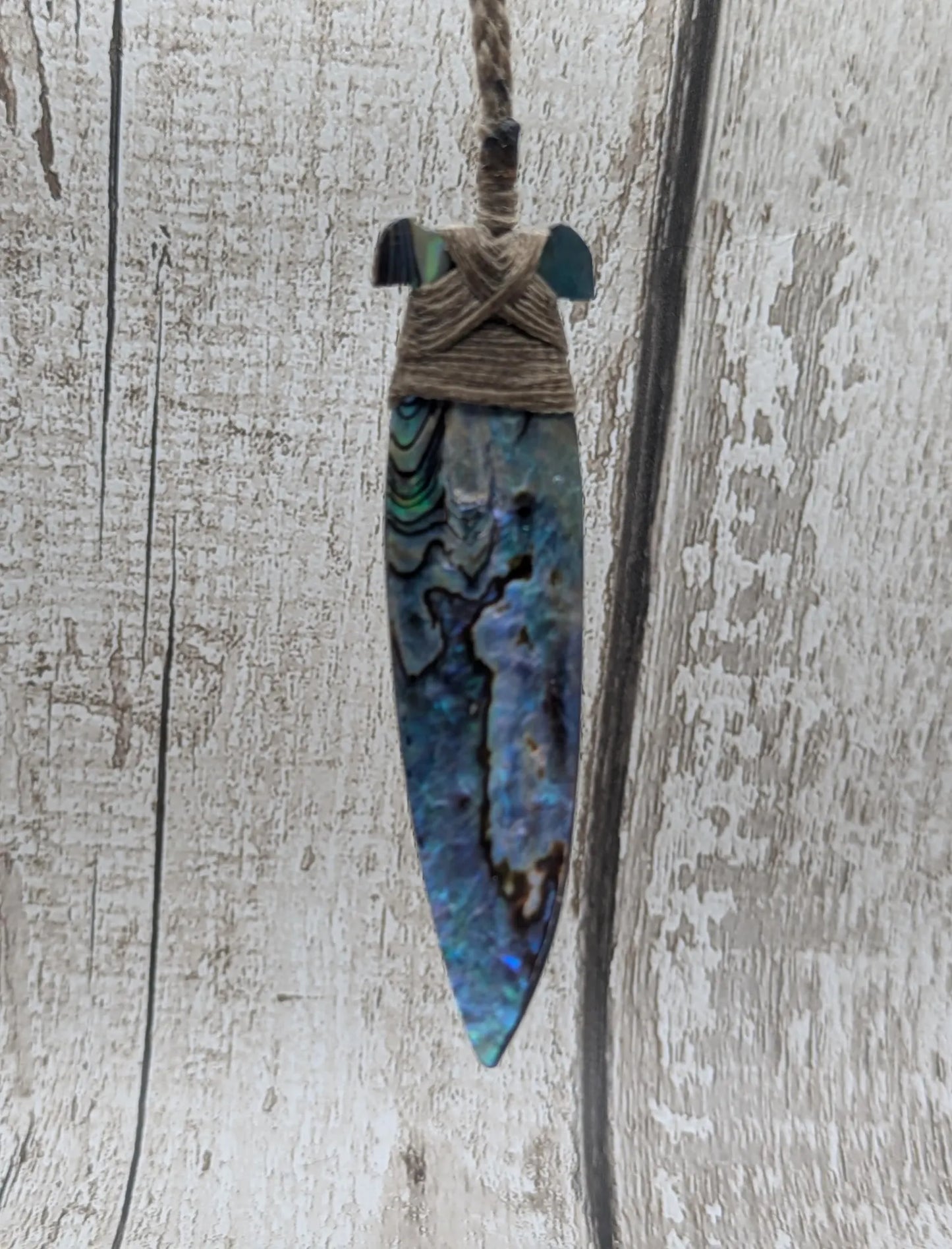 New Zealand Rainbow Pāua Hei Toki Pendant – Iridescent Abalone Adze Necklace sea and ocean themed tonga on Adjustable Cord.