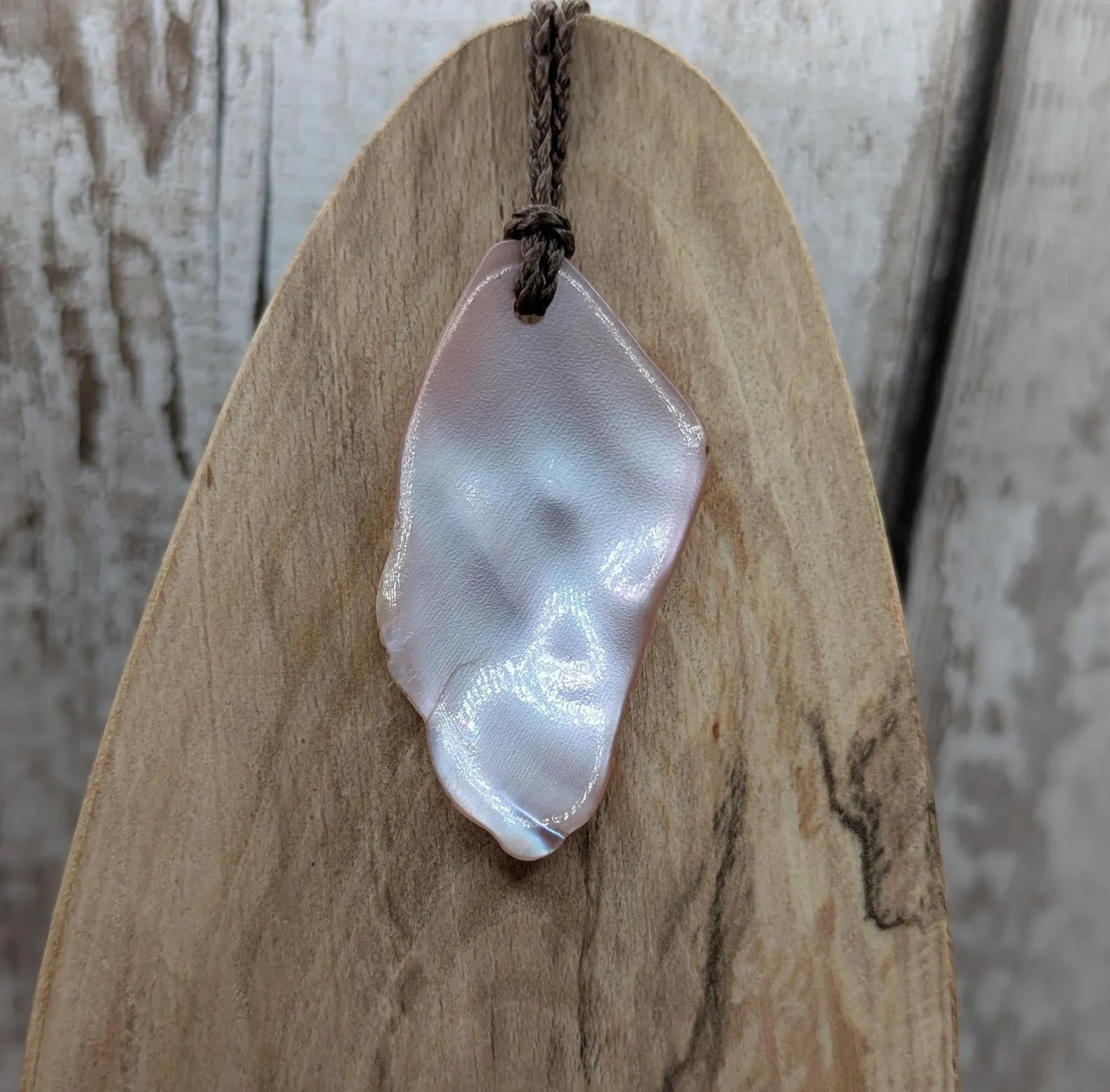 New Zealand pink fresh water mussel, natural tumbled pendant.
