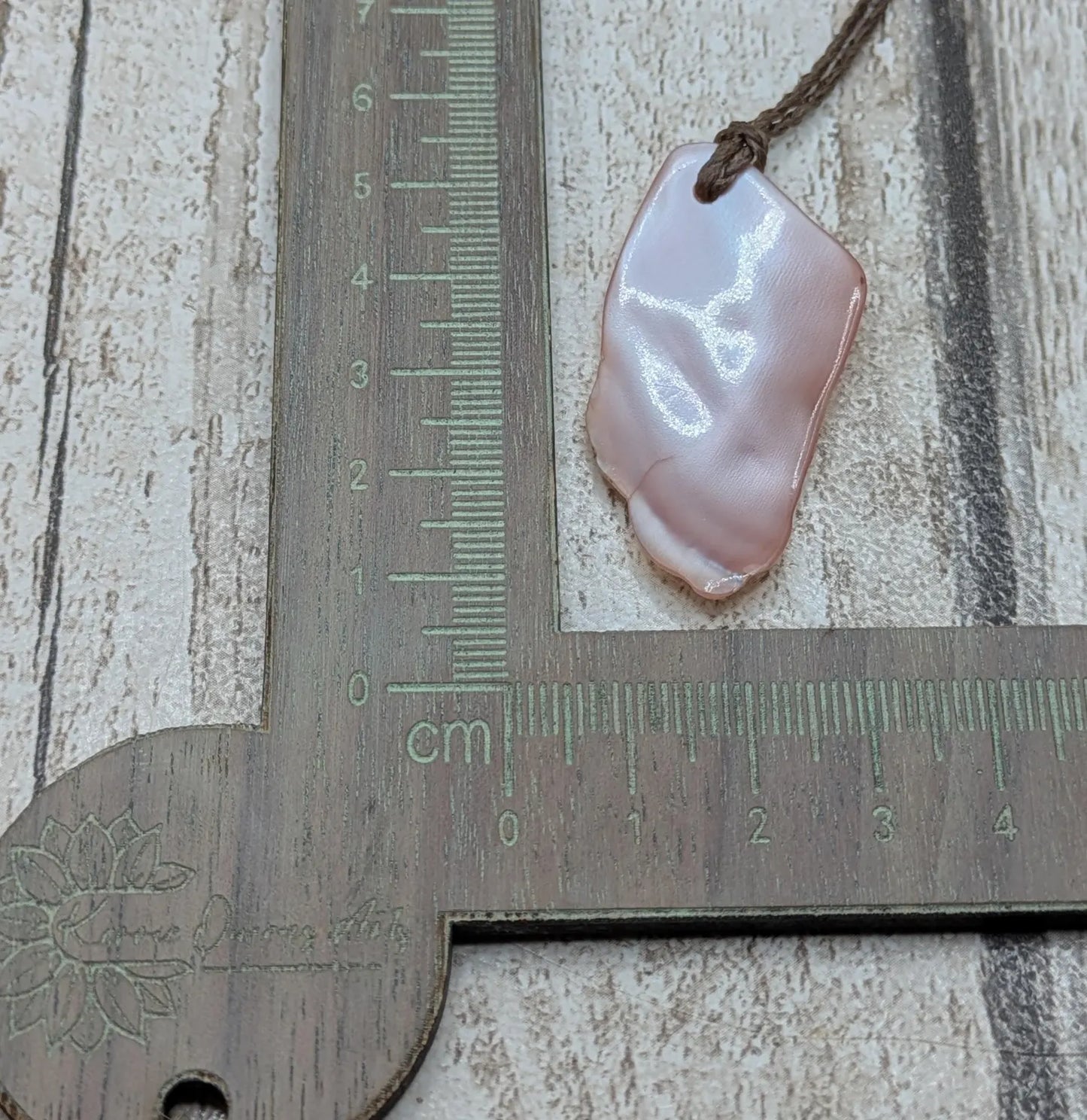 New Zealand pink fresh water mussel, natural tumbled pendant.