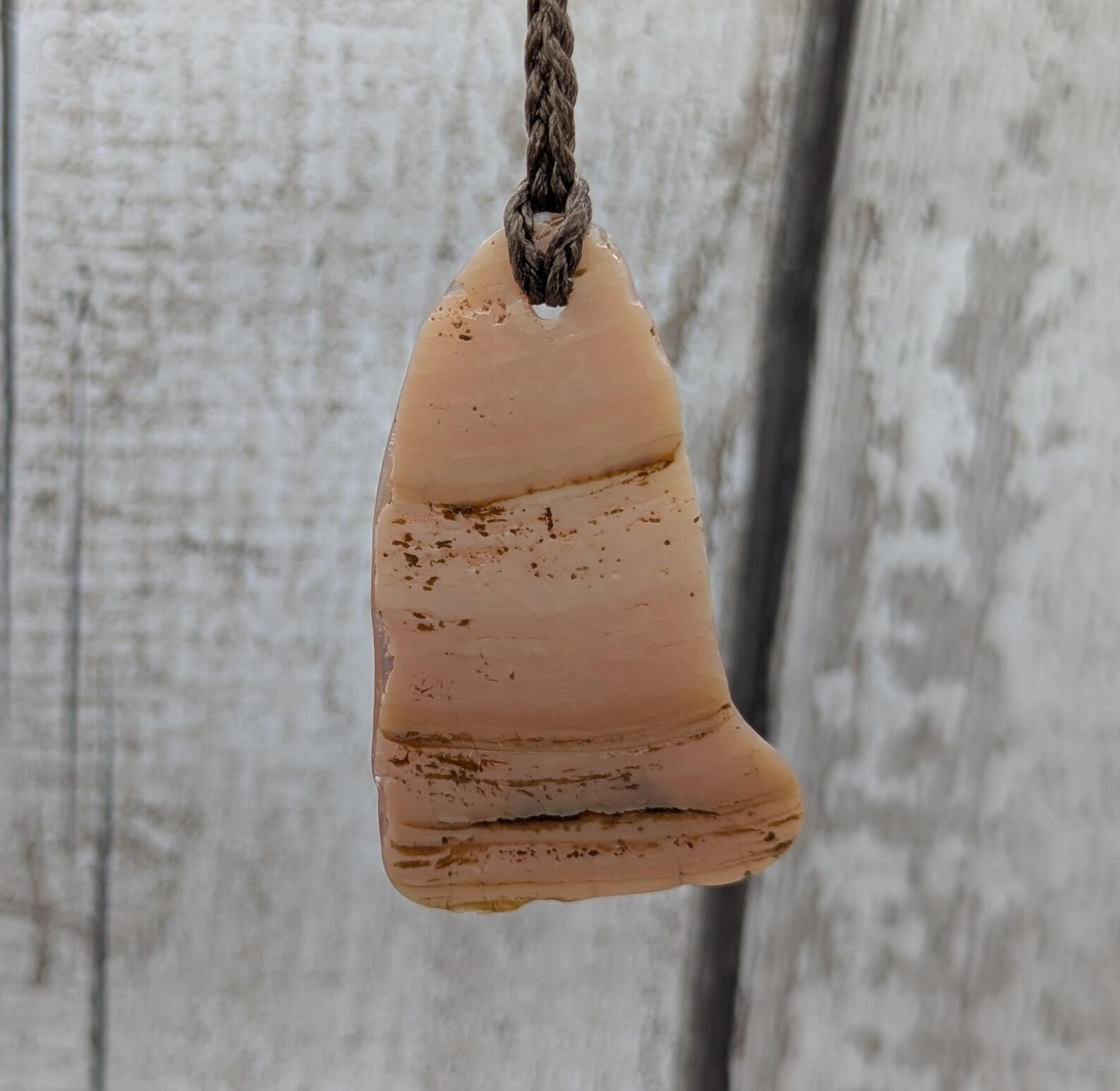 Pink freshwater mussel shell tumbled pendant.