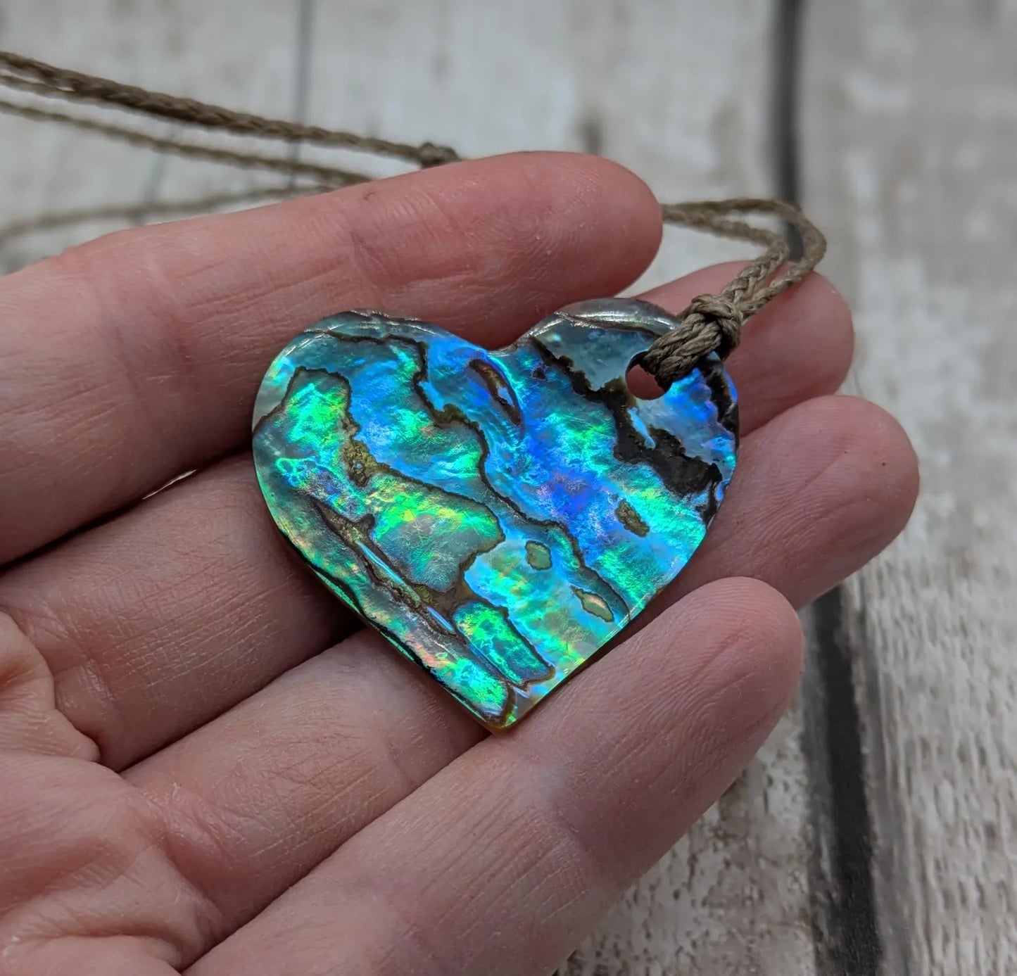 New Zealand Rainbow Pāua Heart Pendant – sea ocean themed love Tonga, Iridescent Abalone Necklace on Adjustable Waxed Cord.
