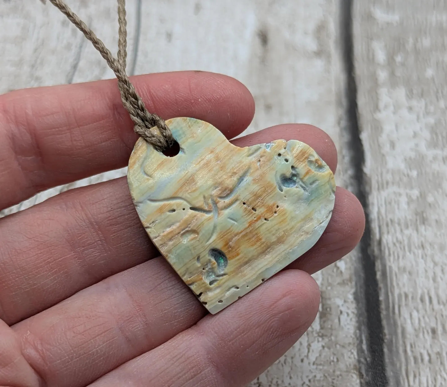 New Zealand Rainbow Pāua Heart Pendant – sea ocean themed love Tonga, Iridescent Abalone Necklace on Adjustable Waxed Cord.
