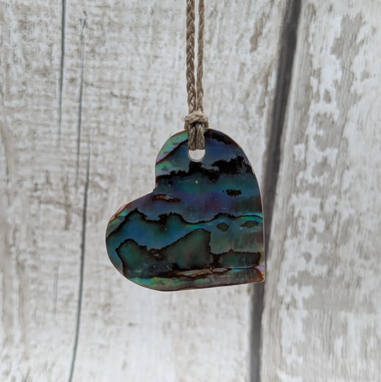 New Zealand Rainbow Pāua Heart Pendant – sea ocean themed love Tonga, Iridescent Abalone Necklace on Adjustable Waxed Cord.