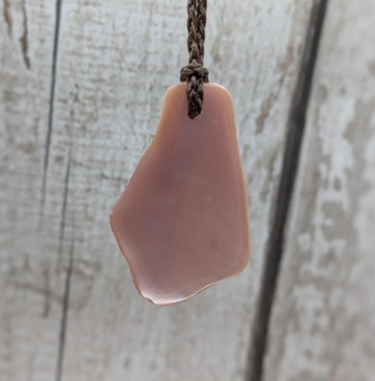 New Zealand pink mussel shell tumbled pendant.