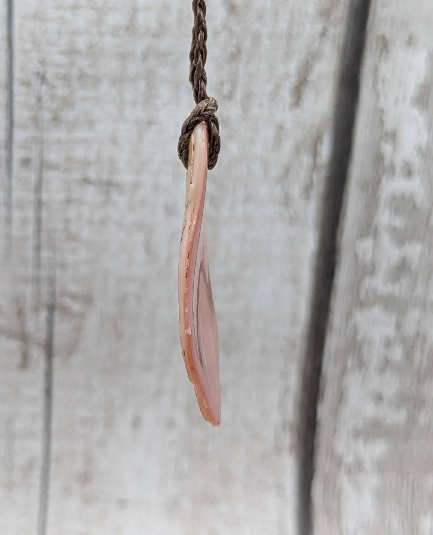 New Zealand pink mussel shell tumbled pendant.