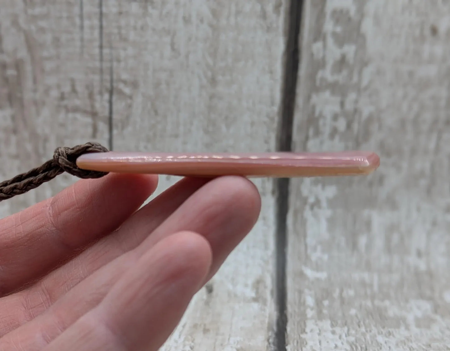 New Zealand pink freshwater mussel shell roimata pendant.