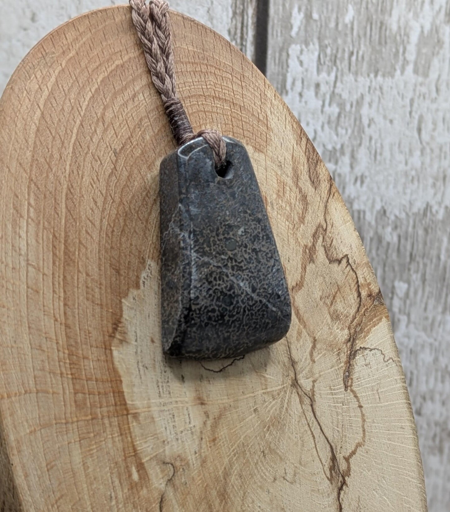 Oxfordshire sourced dinosaur bone slab Toki style pendant.